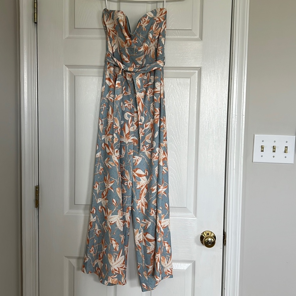 H&M tropical floral jumpsuit size US 6. Comes with belt, has side zipper.